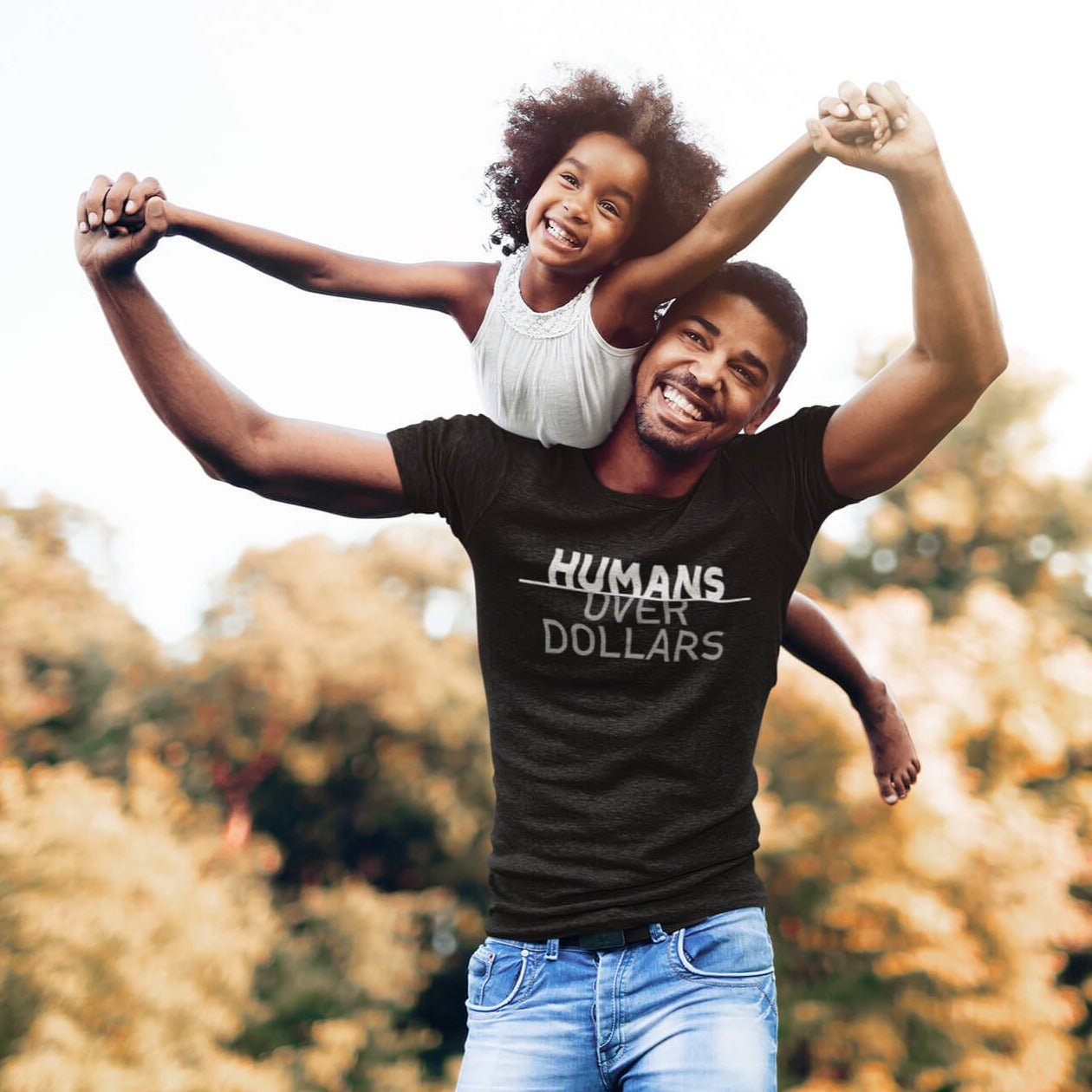 Humans Over Dollars Tee