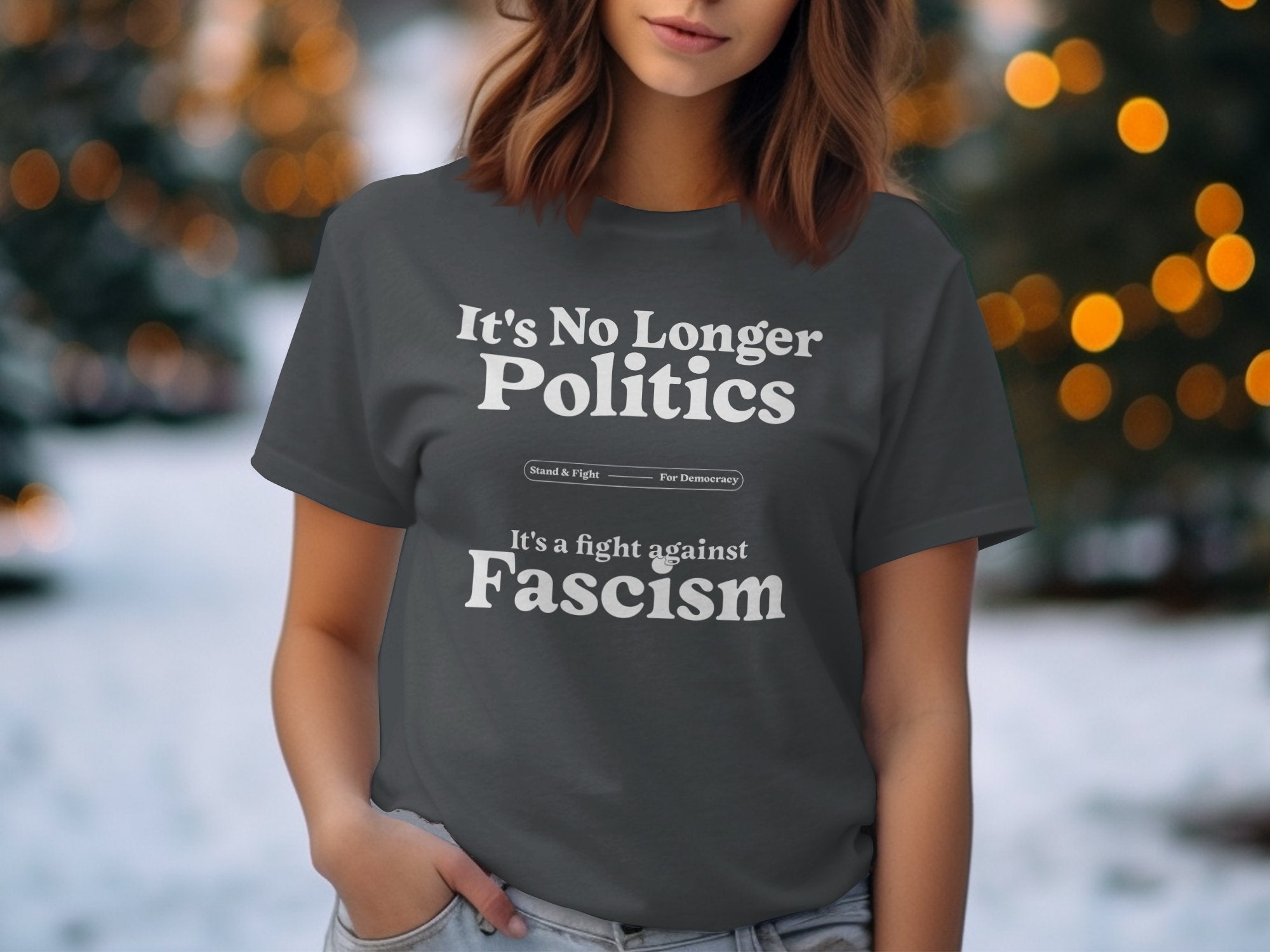 a woman wearing a t - shirt that says it's no longer politics