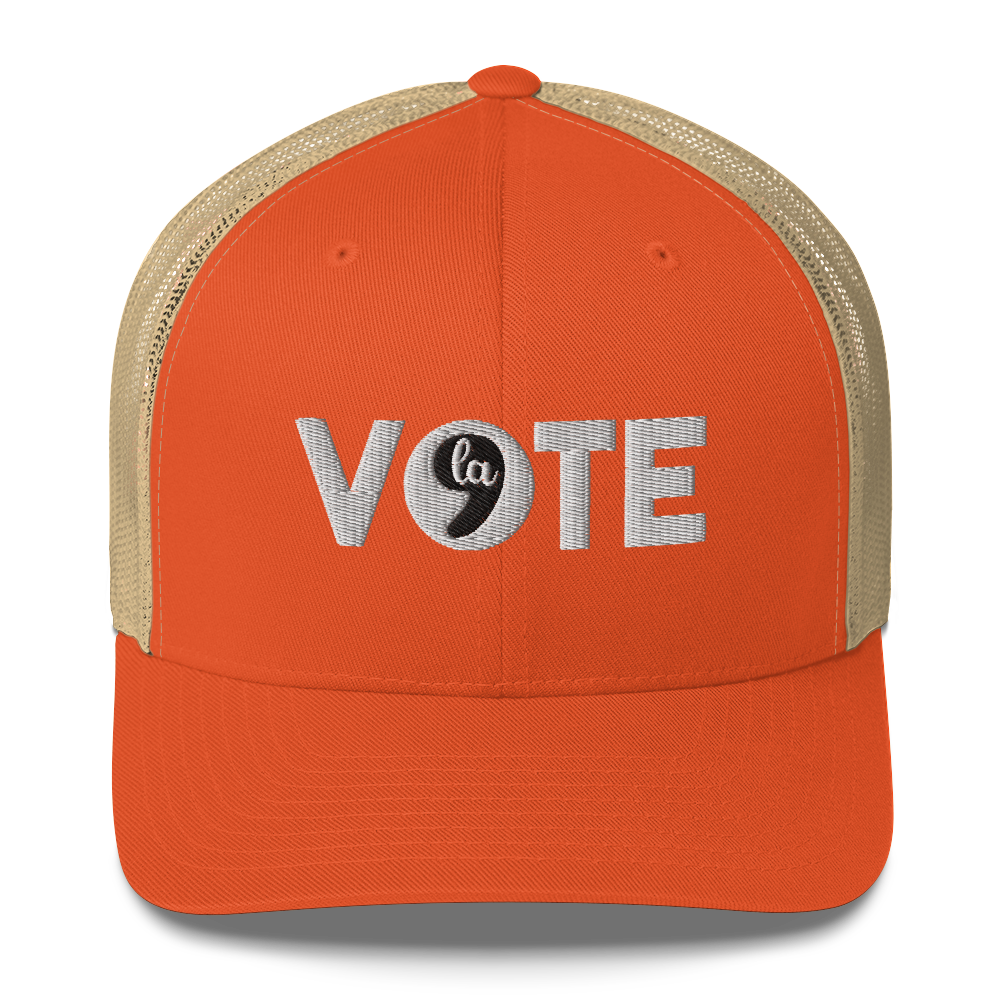 Vote Comma La Trucker Hat